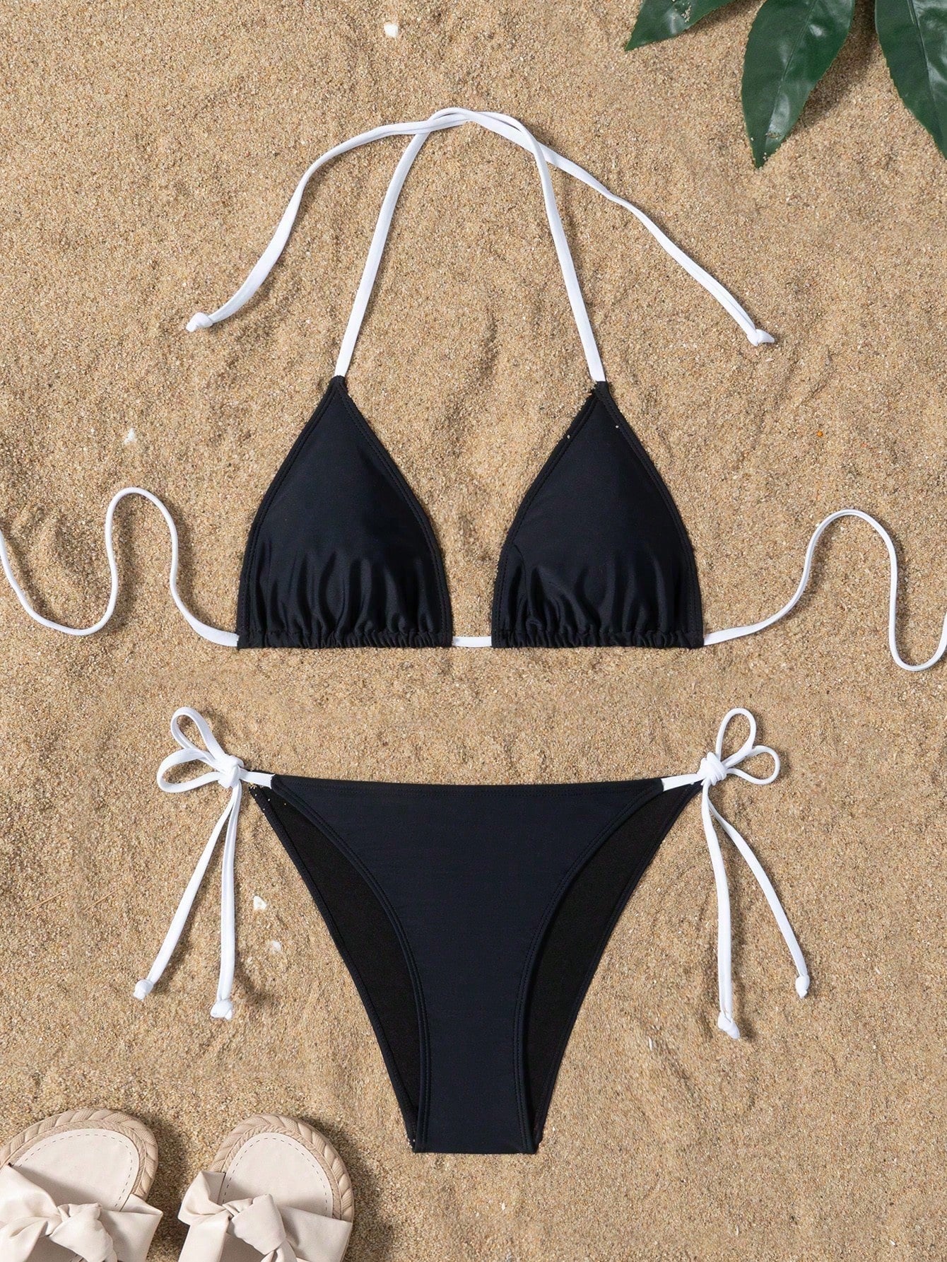 Women's high waist halter tie bikini swimwear set featuring triangle cups, wireless bra with removable padding, and tie side bottoms.
