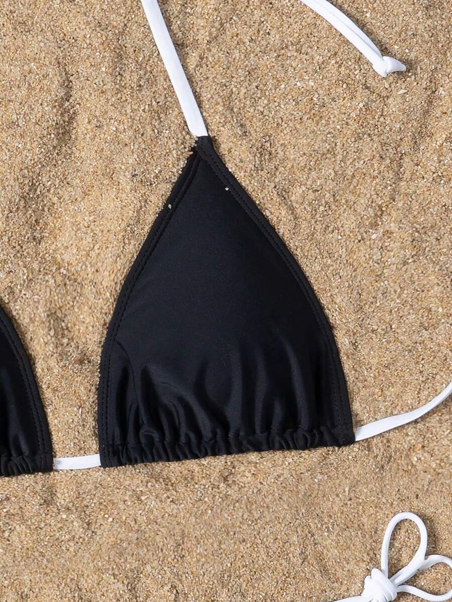 Women's high waist halter tie bikini swimwear set featuring triangle cups, wireless bra with removable padding, and tie side bottoms.
