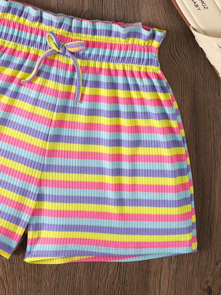 Black and white striped 2-piece set for tween girls featuring a halter sleeveless pullover top with criss-cross knot detail and matching paperbag waist shorts.