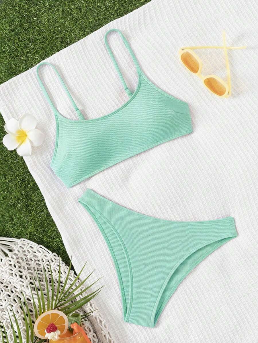 Apricot ribbed high waist two piece bikini swimsuit set for women featuring backless spaghetti strap top and high waisted bottoms.