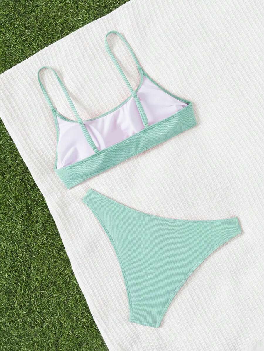 Apricot ribbed high waist two piece bikini swimsuit set for women featuring backless spaghetti strap top and high waisted bottoms.