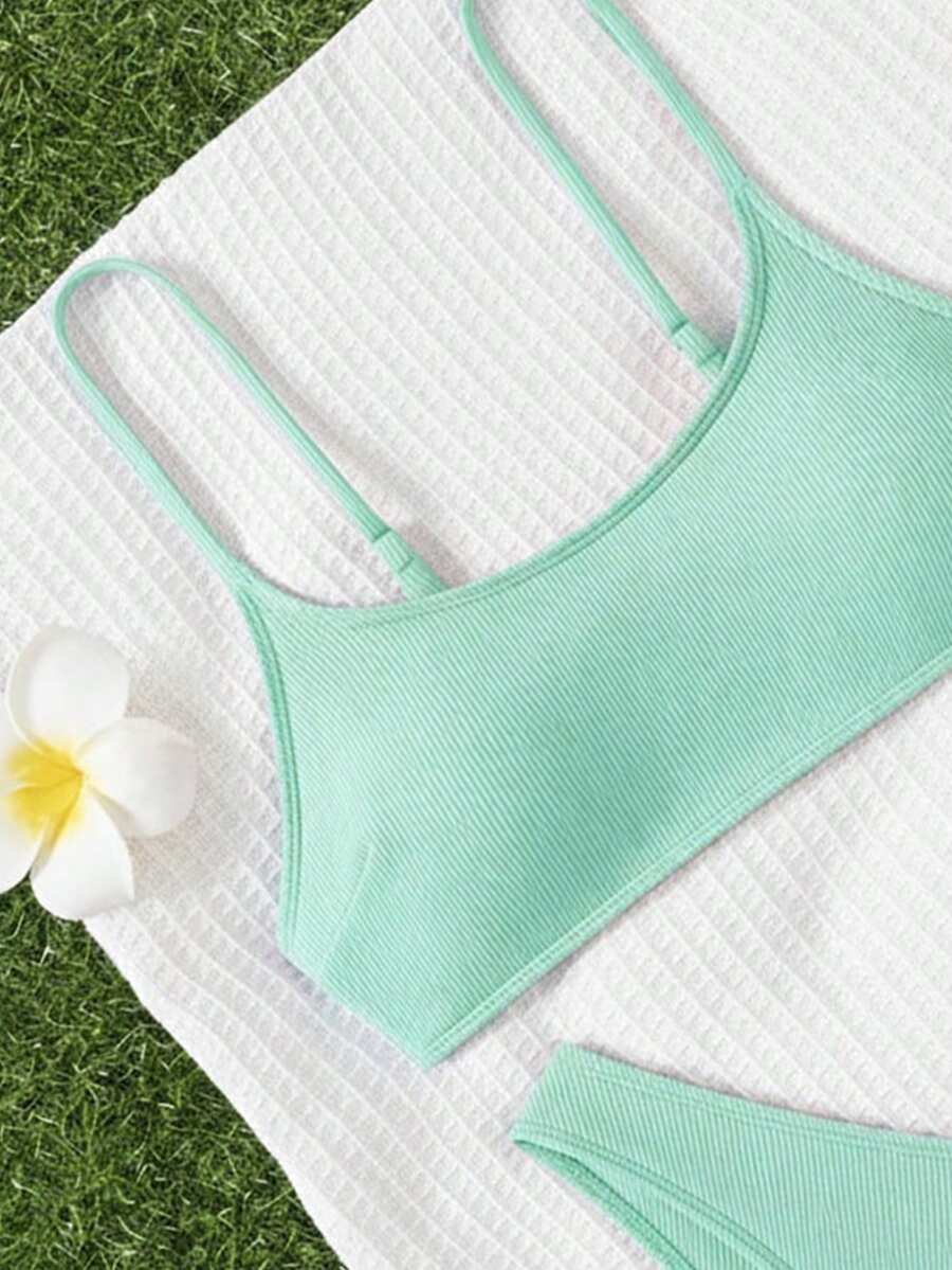 Apricot ribbed high waist two piece bikini swimsuit set for women featuring backless spaghetti strap top and high waisted bottoms.