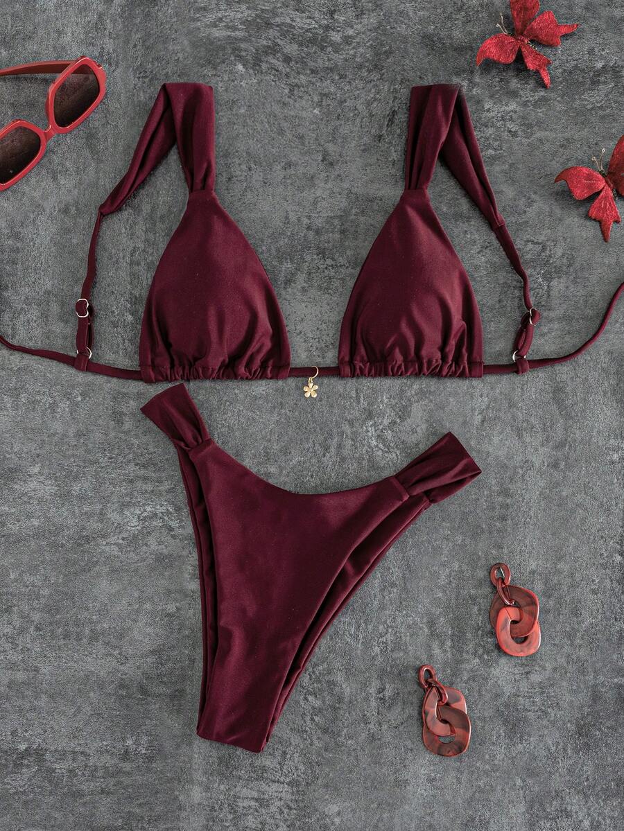 Women's solid yellow 2-piece bikini set featuring a high-waist bottom and a wireless bandeau top on display for beach and resort wear.