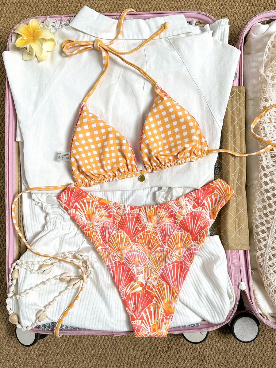 Women's black textured plaid 2-piece bikini set featuring a halter neckline, wireless triangle cups with removable padding, and mid-waist bottoms.