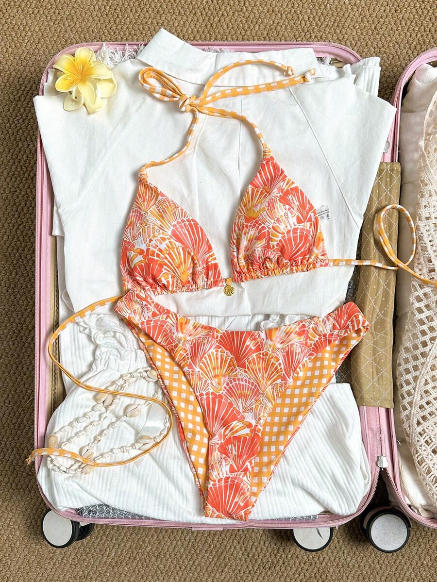 Women's black textured plaid 2-piece bikini set featuring a halter neckline, wireless triangle cups with removable padding, and mid-waist bottoms.