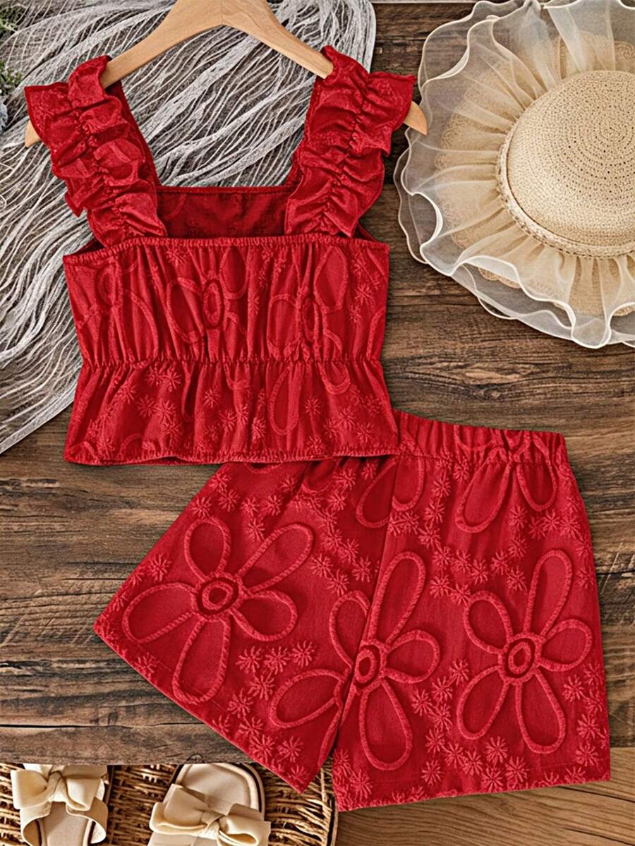 Apricot two-piece summer outfit for tween girls featuring a sleeveless pleated square-neck camisole top with button details and matching gathered shorts.