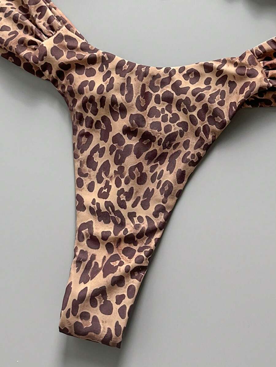Women's 2-piece triangle cup bikini set in solid color featuring woven pearl shell decoration, halter neckline, and high-waist side-tie ruched bottoms.