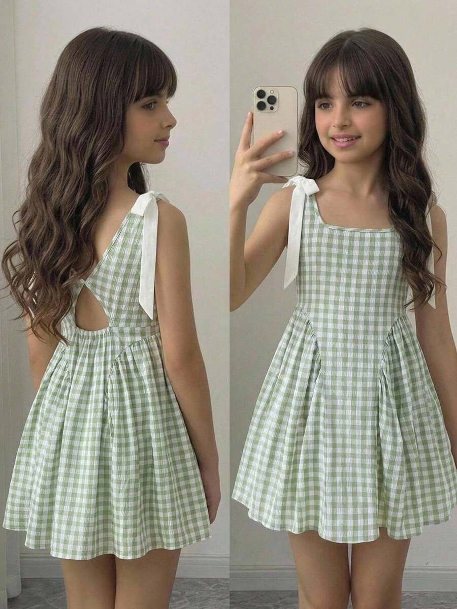 Black and white polka dot sleeveless A-line dress for tween girls featuring a scoop neck, high waist, and flared hem.