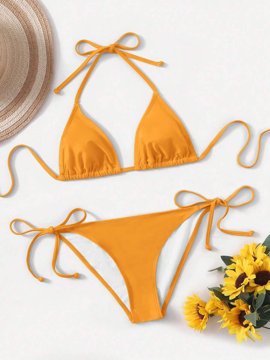 Women's high waist halter tie bikini swimwear set featuring triangle cups, wireless bra with removable padding, and tie side bottoms.