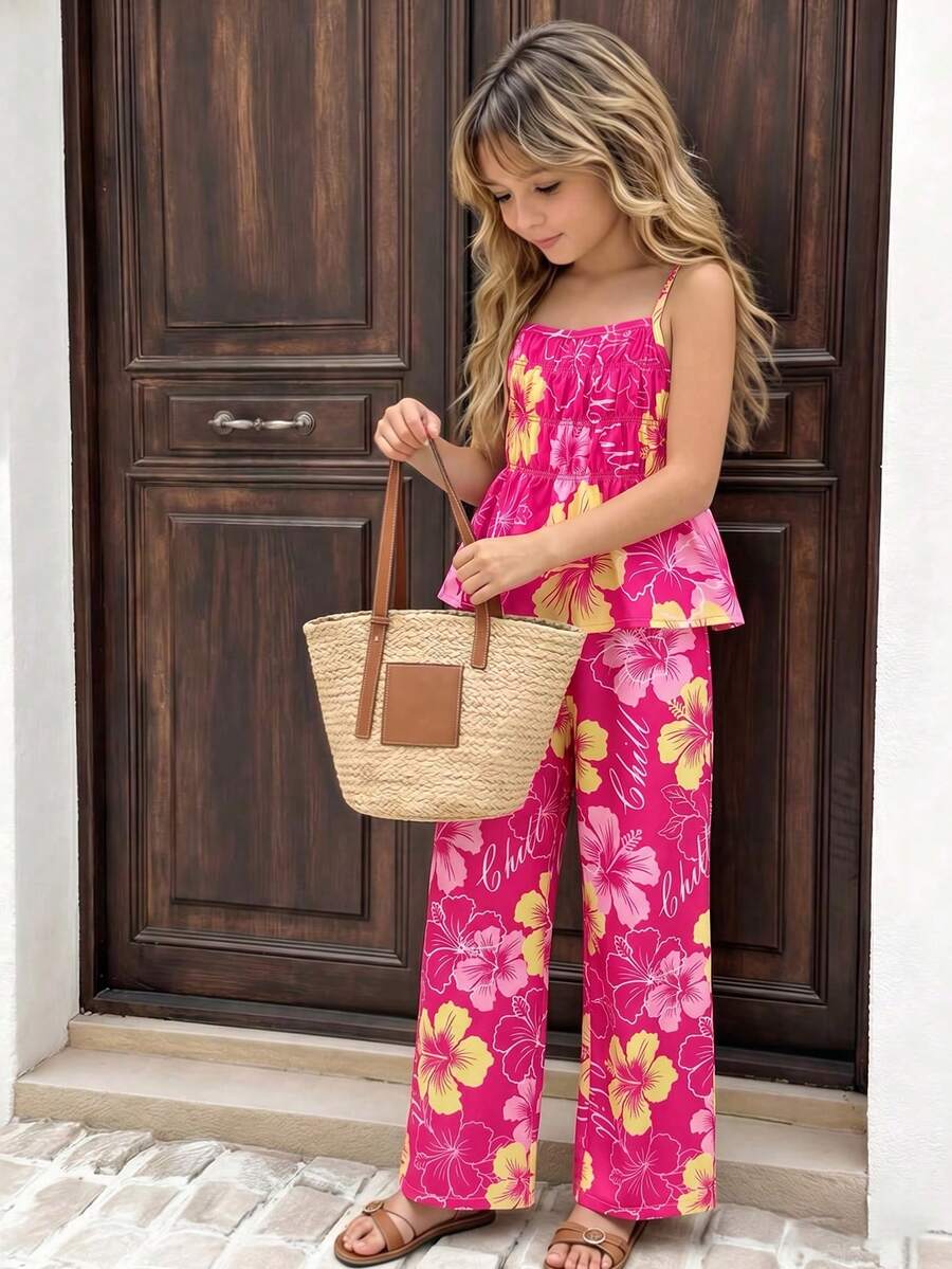 Tween girl wearing an apricot 2-piece outfit set featuring a shirred spaghetti strap short cami top and matching wide-leg long pants.