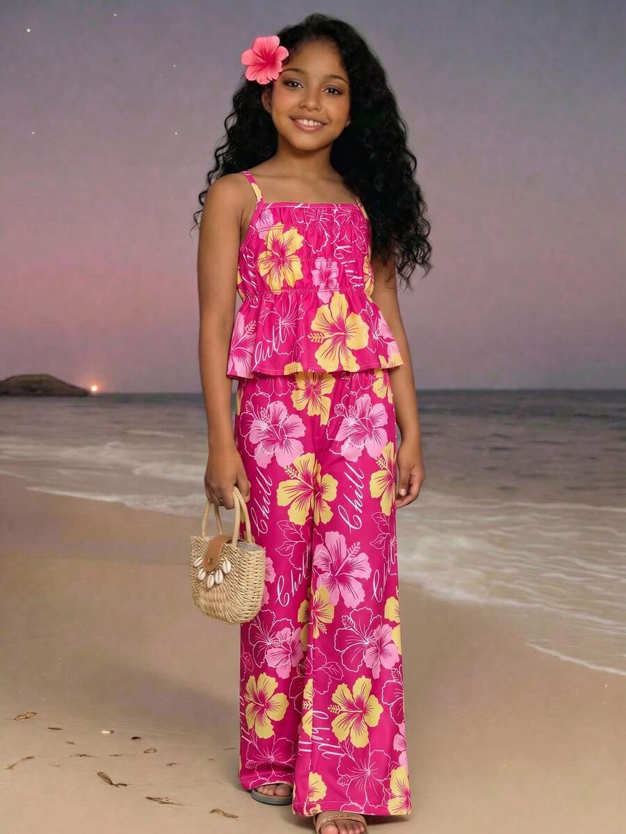 Tween girl wearing an apricot 2-piece outfit set featuring a shirred spaghetti strap short cami top and matching wide-leg long pants.