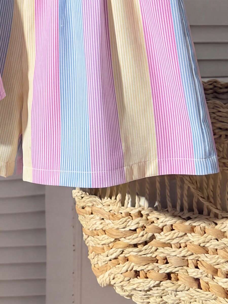 Tween girls 2-piece summer vacation set featuring a multicolored geometric print sleeveless camisole top with bow knot detail and matching elastic waist shorts.