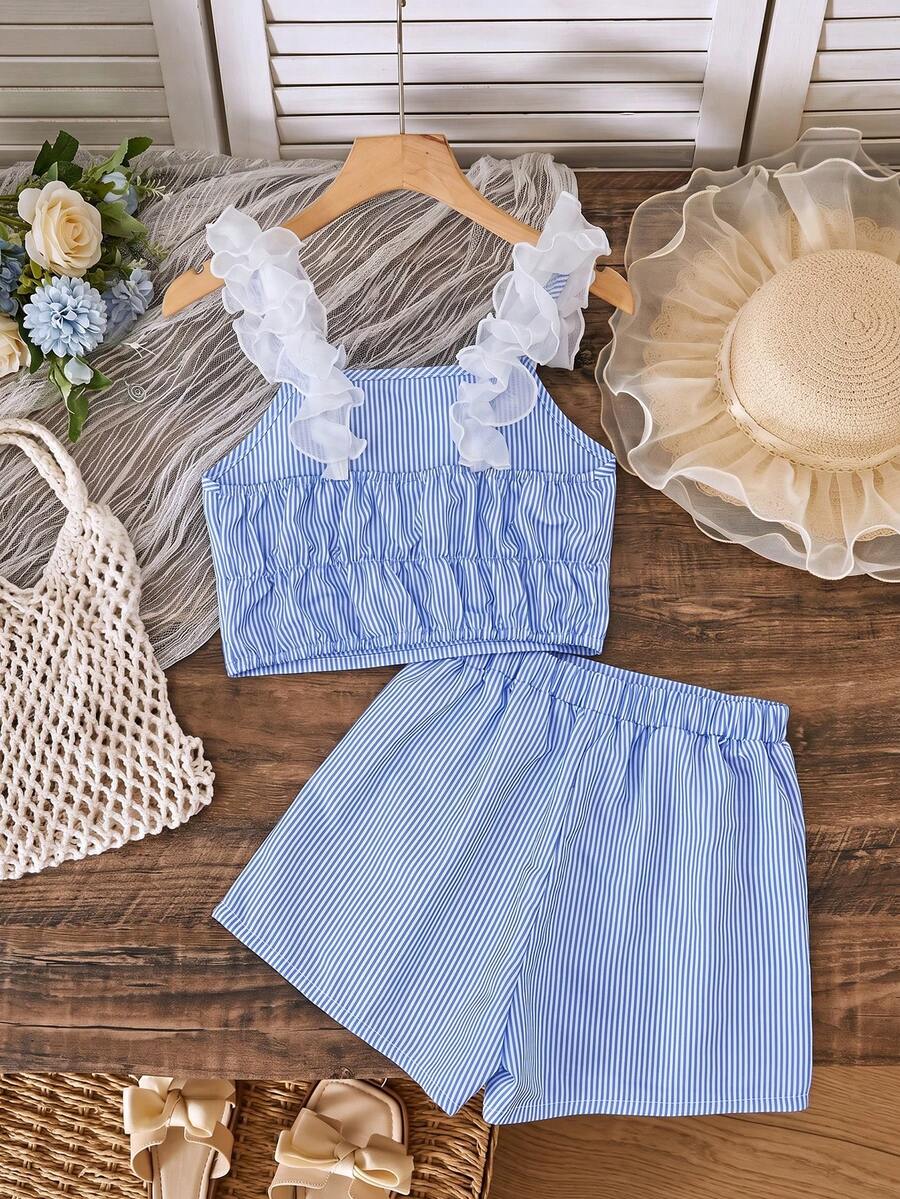 Apricot two-piece summer outfit for tween girls featuring a sleeveless pleated square-neck camisole top with button details and matching gathered shorts.