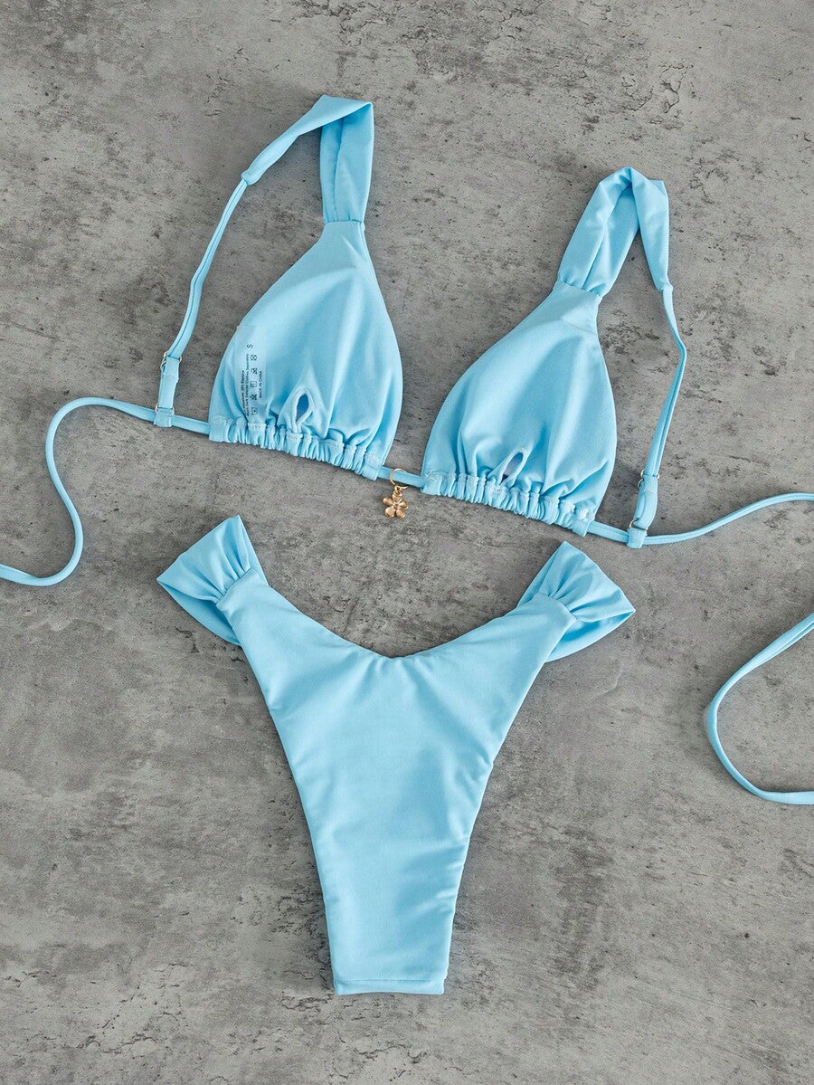 Women's solid yellow 2-piece bikini set featuring a high-waist bottom and a wireless bandeau top on display for beach and resort wear.