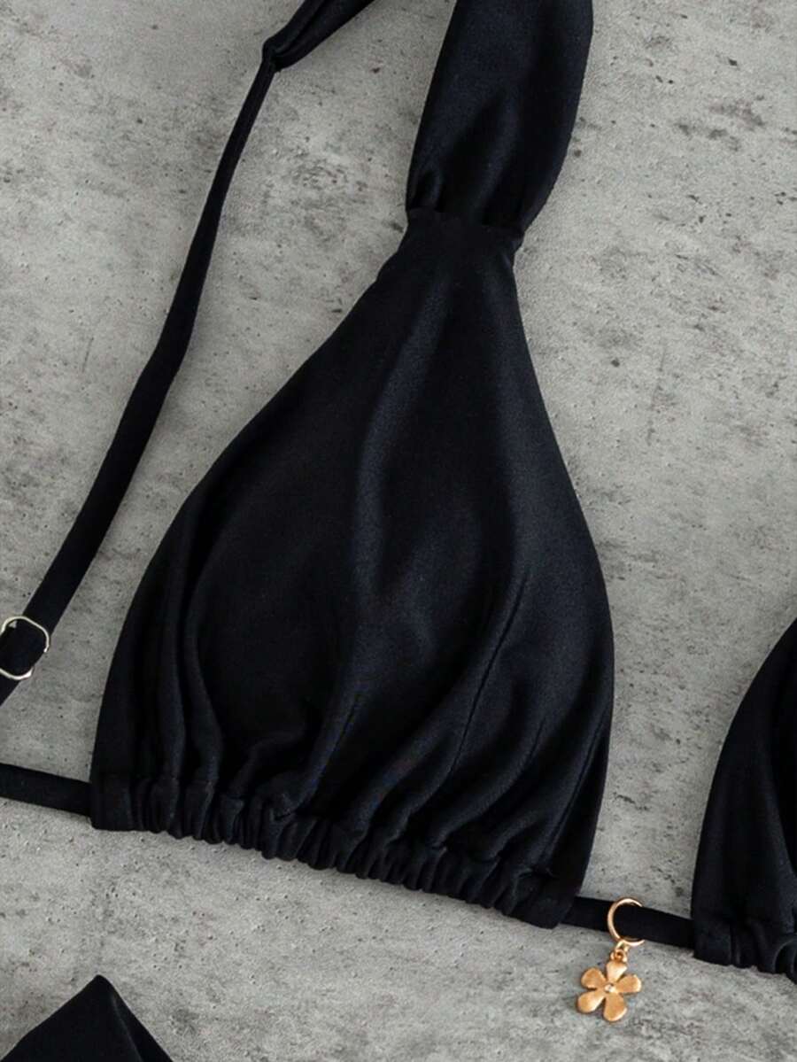Women's solid yellow 2-piece bikini set featuring a high-waist bottom and a wireless bandeau top on display for beach and resort wear.