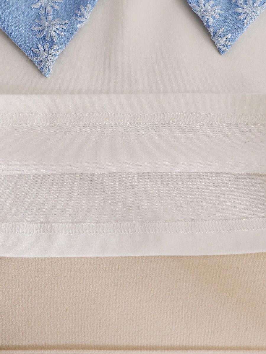 Tween girls 2-piece blue outfit featuring a short sleeve round neck t-shirt with a bow front detail and an asymmetric wrap skort.