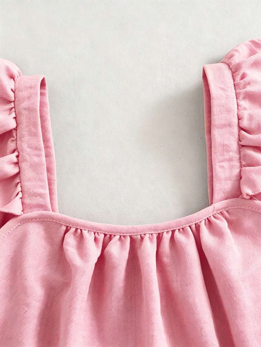 Tween girls 2-piece bohemian outfit set in apricot featuring a square neck embroidered sleeveless camisole top and matching floral wide leg shorts.