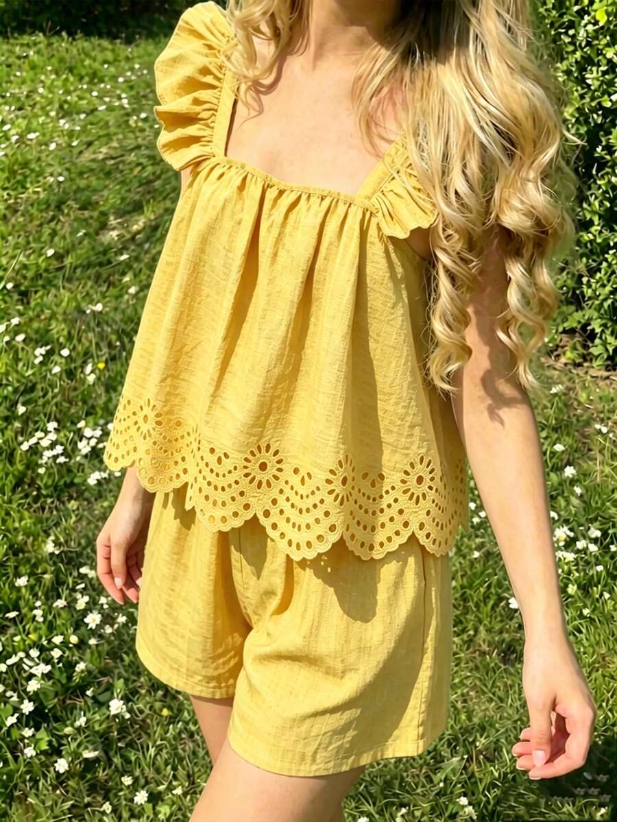 Tween girls 2-piece bohemian outfit set in apricot featuring a square neck embroidered sleeveless camisole top and matching floral wide leg shorts.