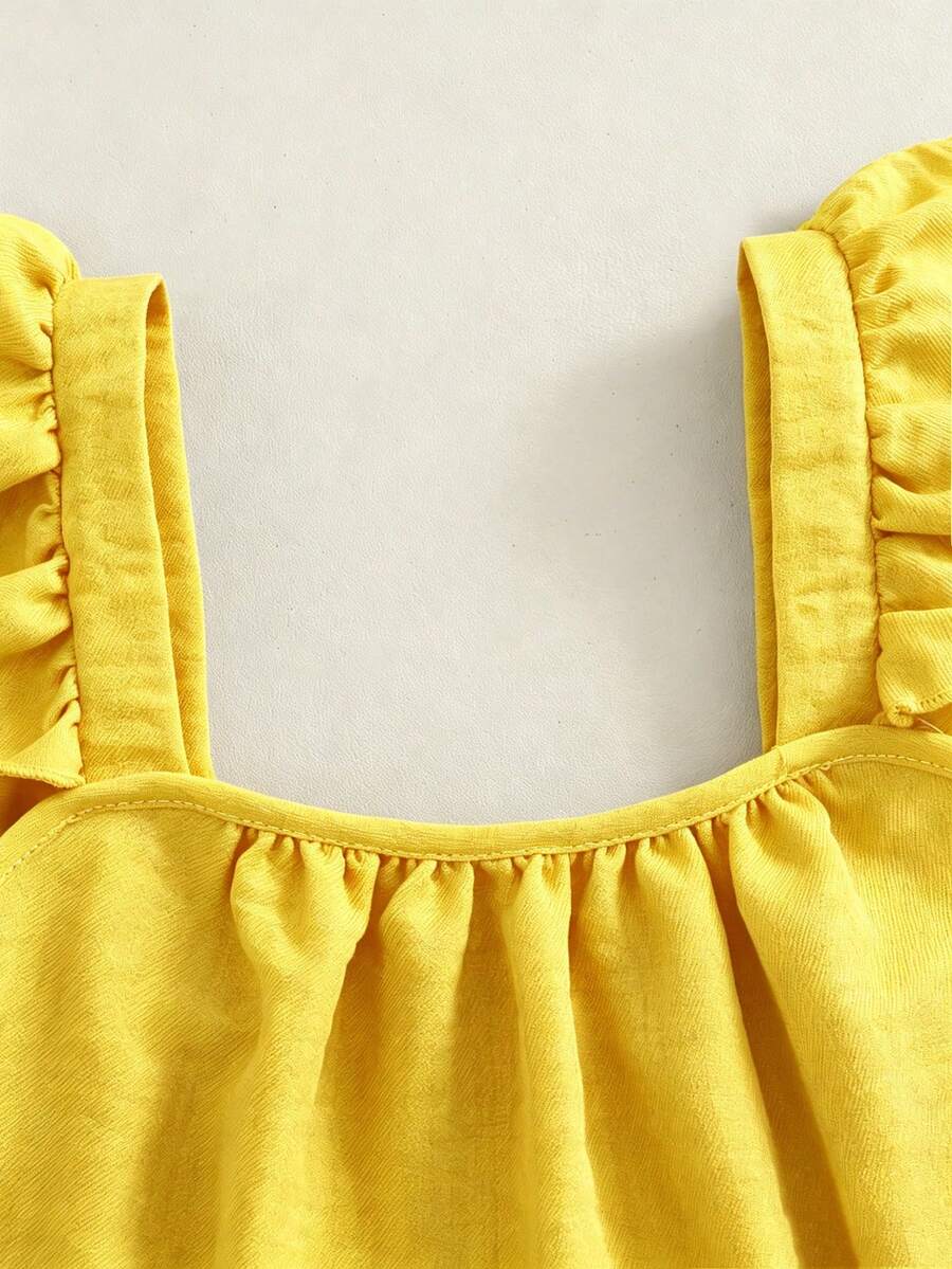 Tween girls 2-piece bohemian outfit set in apricot featuring a square neck embroidered sleeveless camisole top and matching floral wide leg shorts.