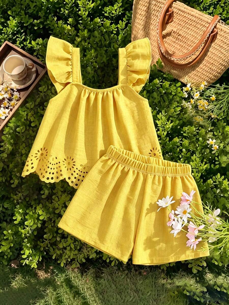 Tween girls 2-piece bohemian outfit set in apricot featuring a square neck embroidered sleeveless camisole top and matching floral wide leg shorts.