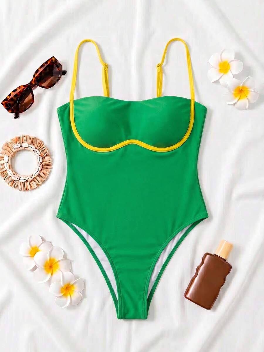 Black colorblock women's one-piece swimsuit with spaghetti straps and high stretch fabric.