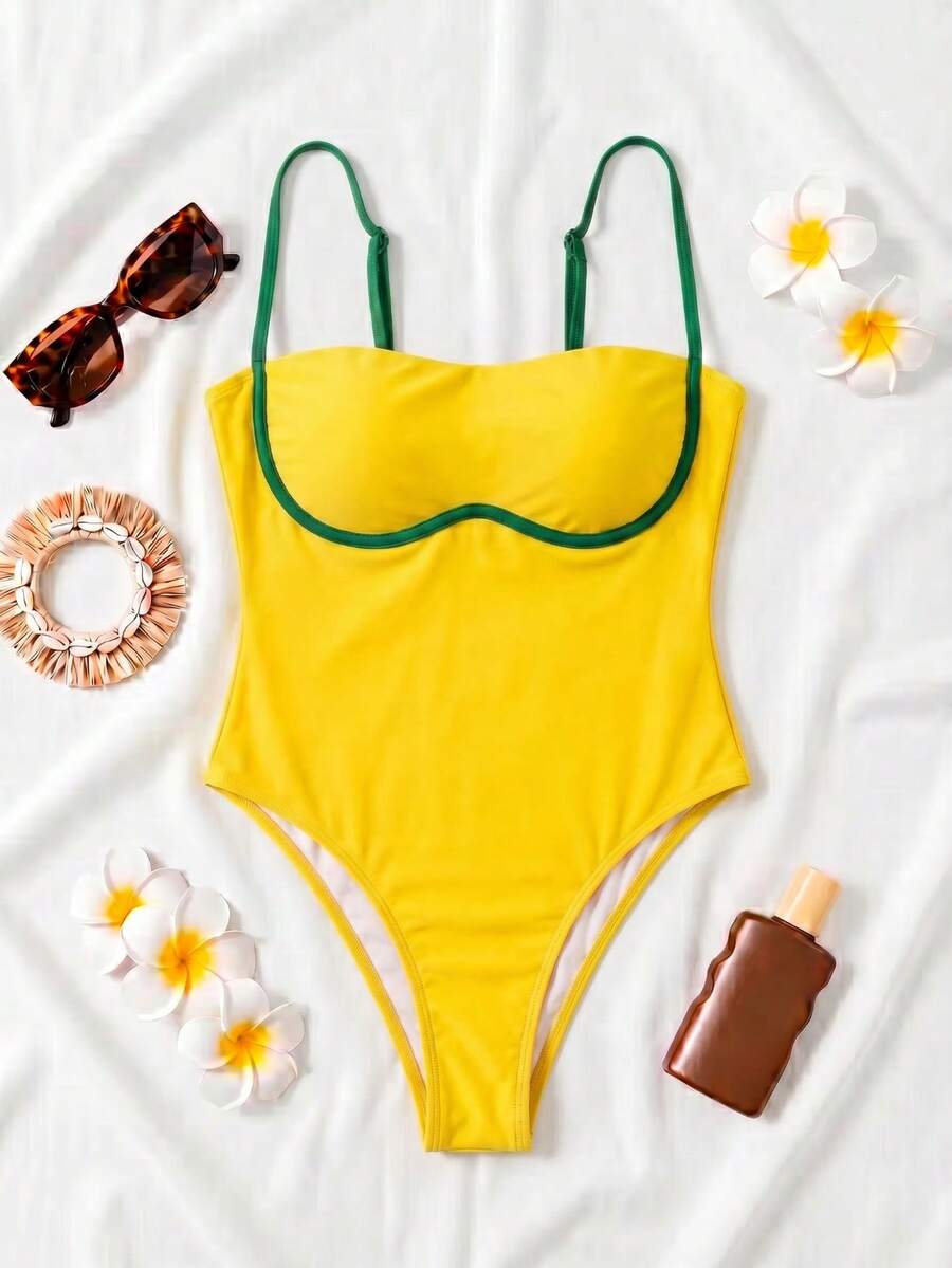Black colorblock women's one-piece swimsuit with spaghetti straps and high stretch fabric.