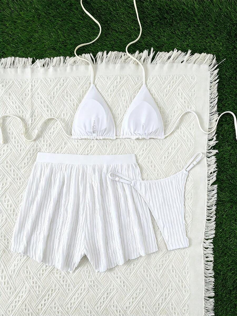 Women's 3-piece frill trim bikini set with halter tie-back top and high waist bottoms.