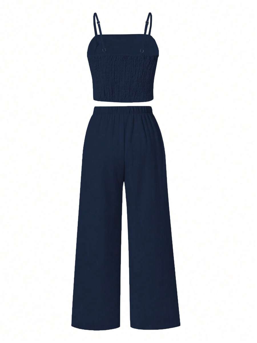 Tween girls casual 2-piece set featuring an apricot woven camisole crop top with back shirring and matching high-waisted loose long pants.