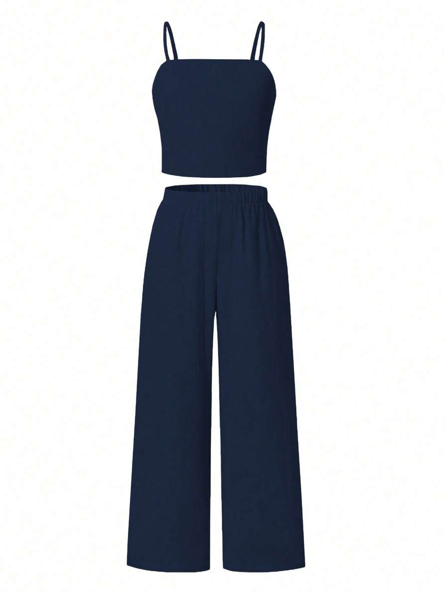 Tween girls casual 2-piece set featuring an apricot woven camisole crop top with back shirring and matching high-waisted loose long pants.