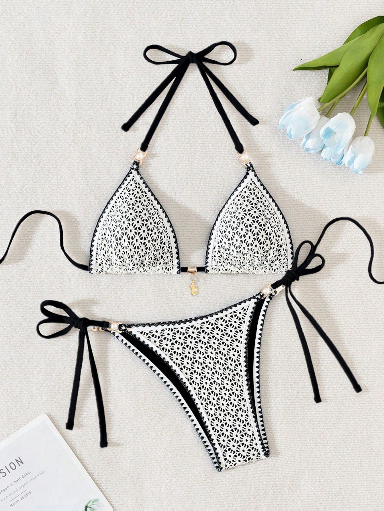 Women's triangle bikini set with contrast lace wireless bra top and ultra high waist tie side bottoms.