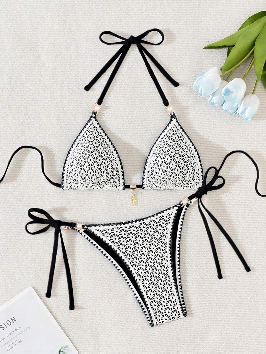 Women's triangle bikini set with contrast lace wireless bra top and ultra high waist tie side bottoms.