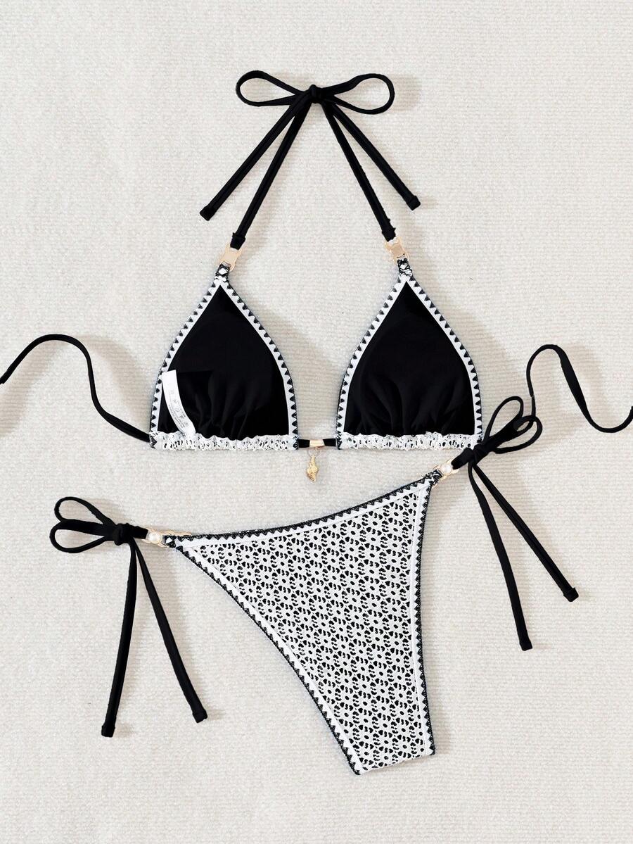 Women's triangle bikini set with contrast lace wireless bra top and ultra high waist tie side bottoms.
