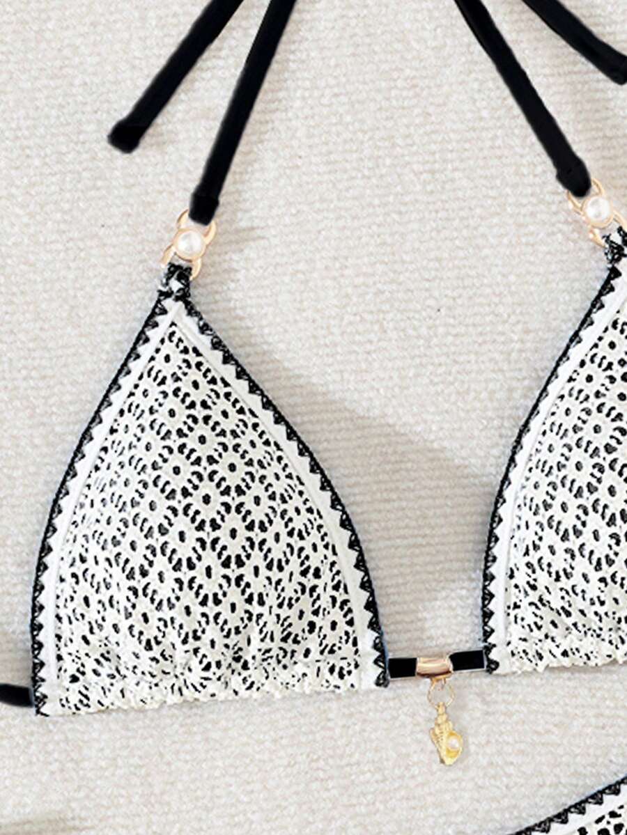 Women's triangle bikini set with contrast lace wireless bra top and ultra high waist tie side bottoms.