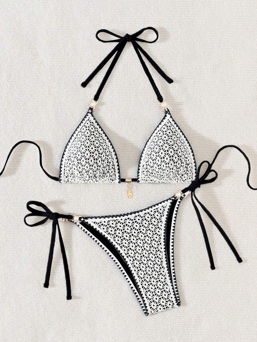 Women's triangle bikini set with contrast lace wireless bra top and ultra high waist tie side bottoms.