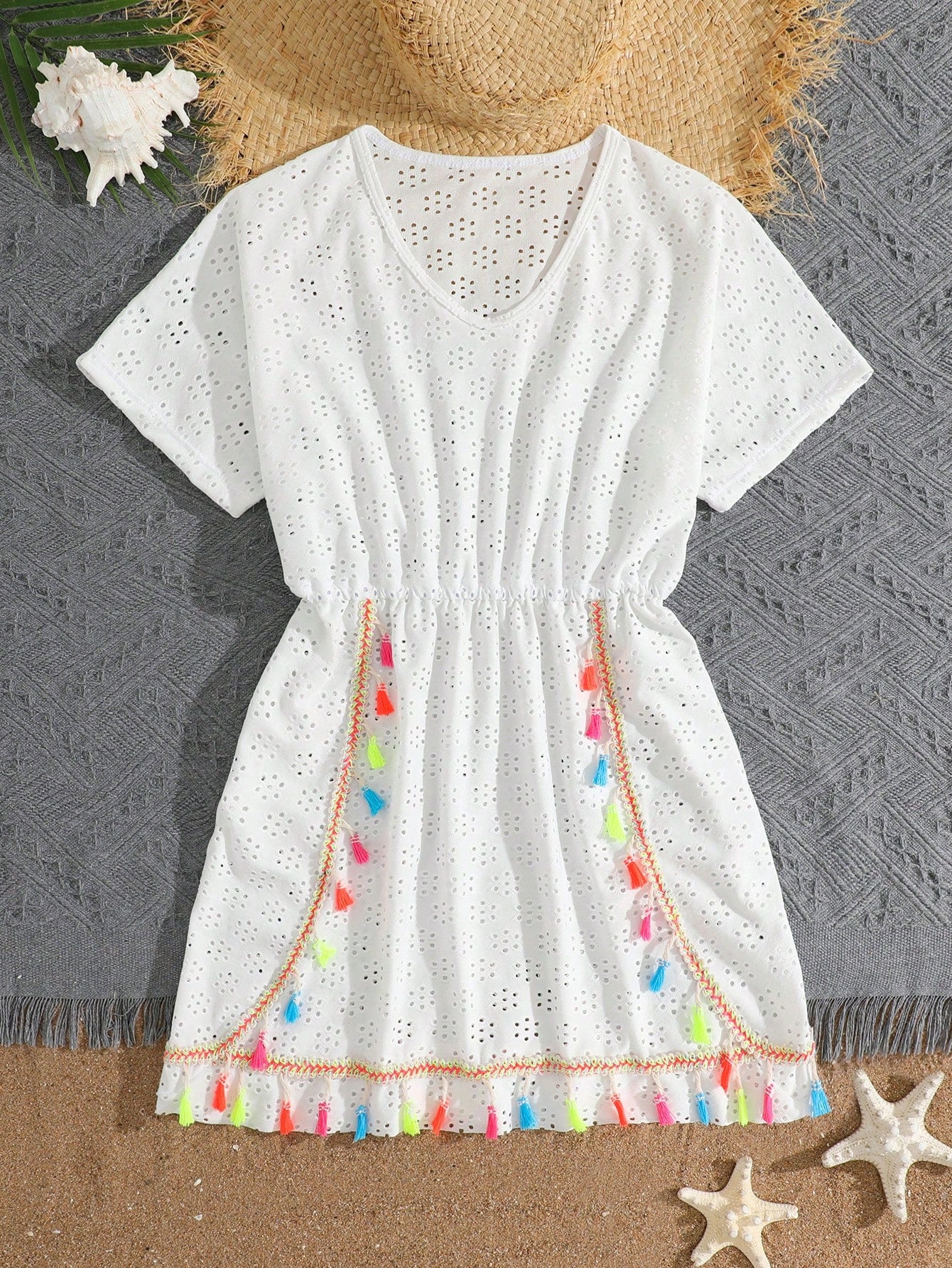 White tween girls swimsuit cover-up with V neck, short sleeves, contrast lace, fringe details, and regular length mesh fabric for beachwear
