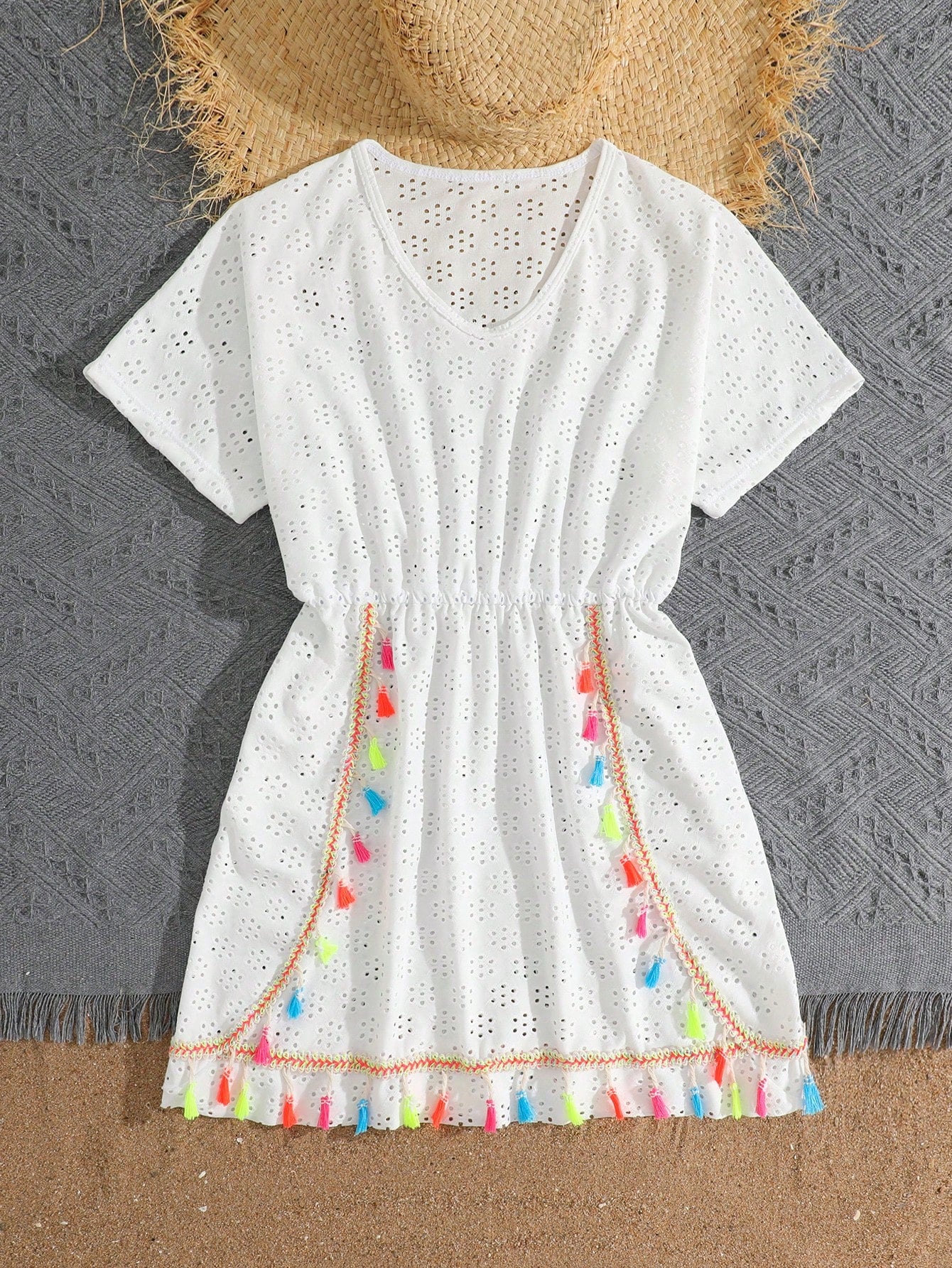 White tween girls swimsuit cover-up with V neck, short sleeves, contrast lace, fringe details, and regular length mesh fabric for beachwear