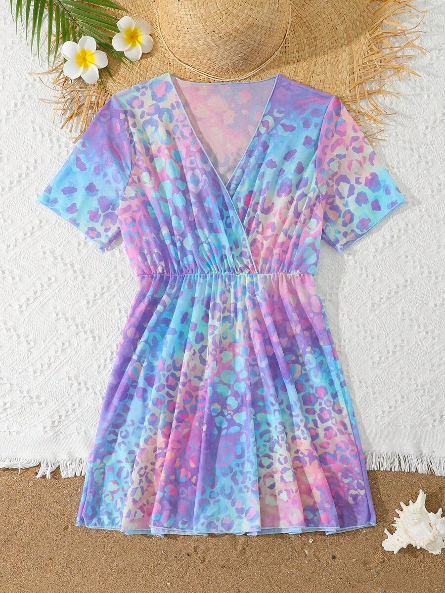 Multicolor heart print long cover up dress for tween girls featuring a V-neck criss-cross wrap front and short sleeves.