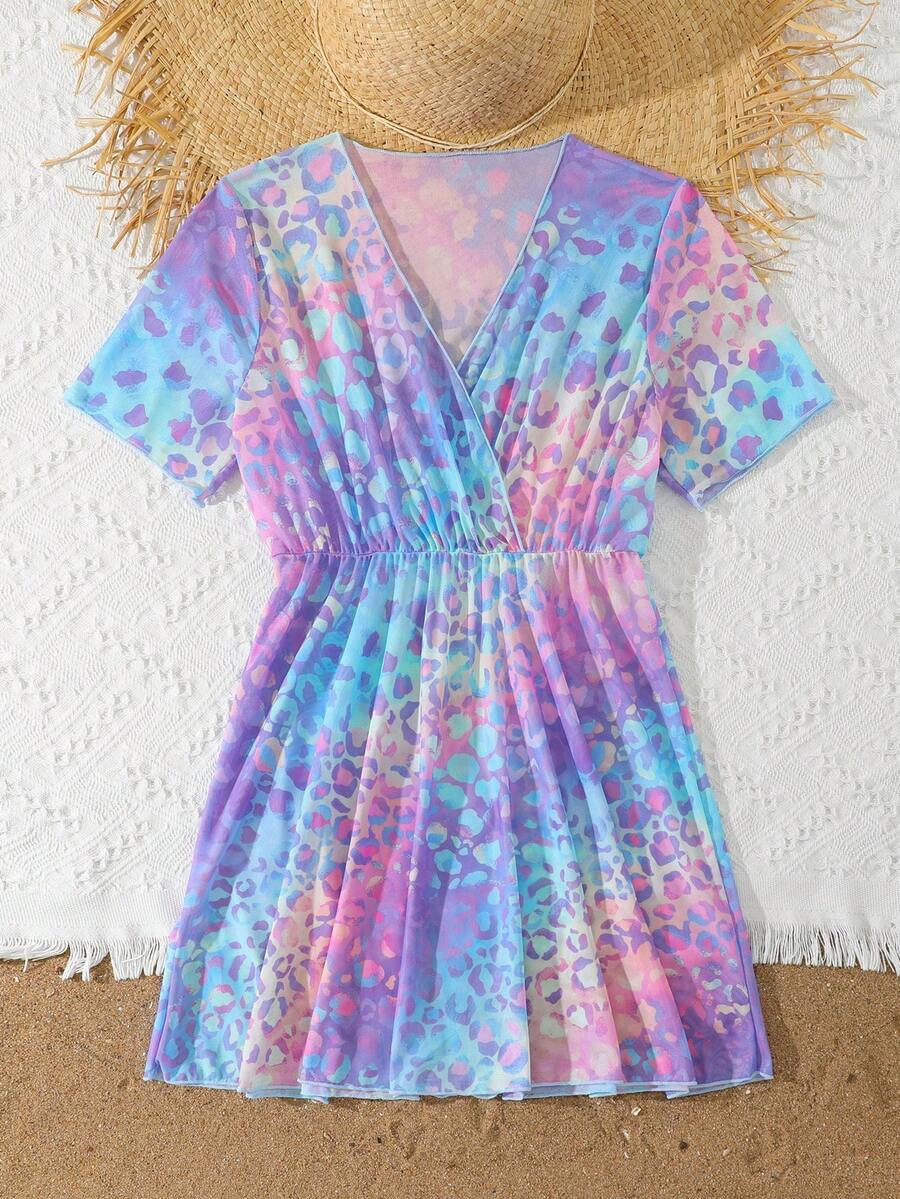 Multicolor heart print long cover up dress for tween girls featuring a V-neck criss-cross wrap front and short sleeves.