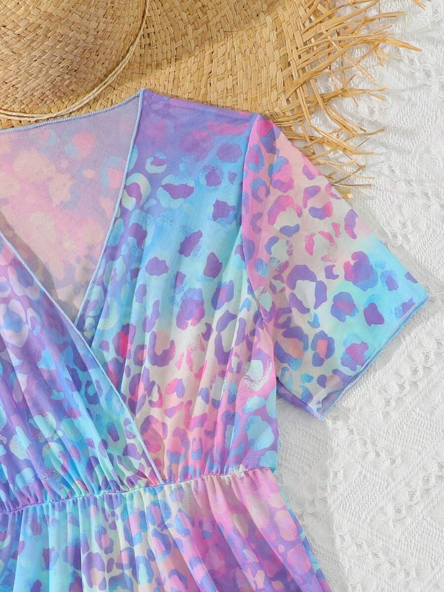 Multicolor heart print long cover up dress for tween girls featuring a V-neck criss-cross wrap front and short sleeves.