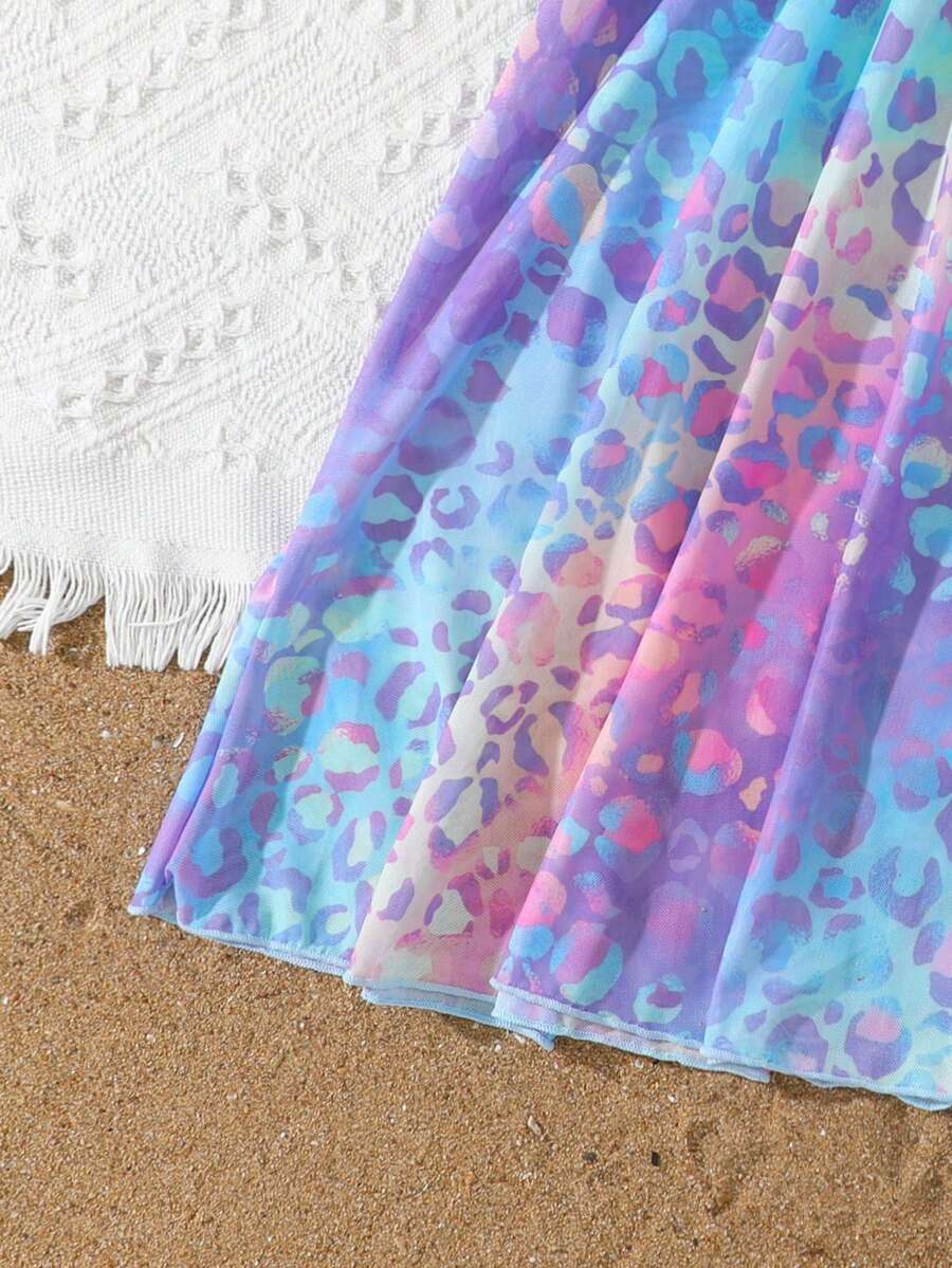 Multicolor heart print long cover up dress for tween girls featuring a V-neck criss-cross wrap front and short sleeves.