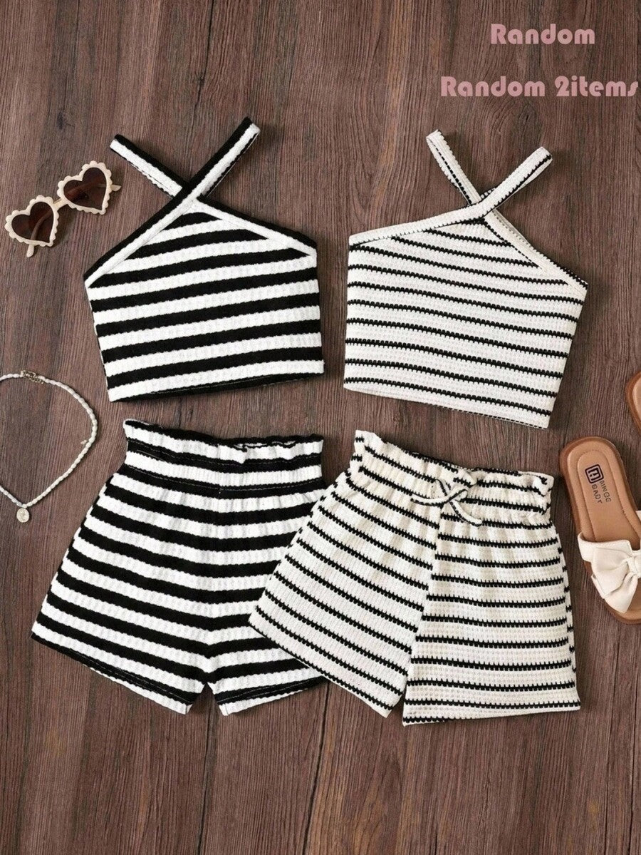 Black and white striped 2-piece set for tween girls featuring a halter sleeveless pullover top with criss-cross knot detail and matching paperbag waist shorts.