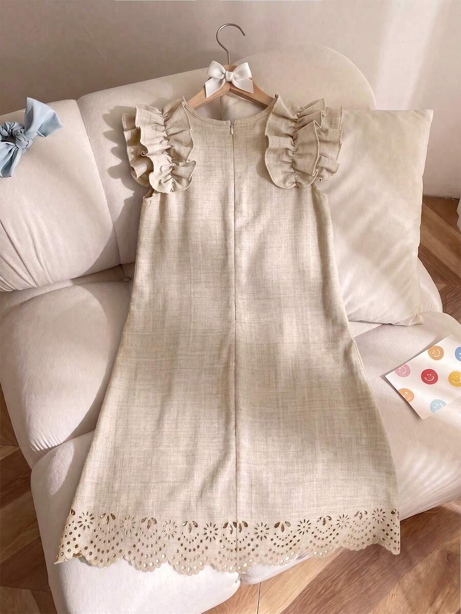 Tween girls apricot vacation midi dress featuring a round neck, cut out details, ruffle flounce accents, and geometric pattern.