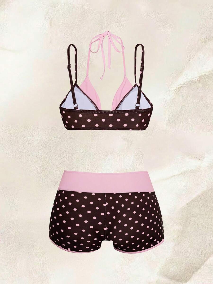 Women's retro pink and blue cartoon sardine print halter two-piece swimwear featuring a high waist shorts bottom and wireless bra with removable padding.
