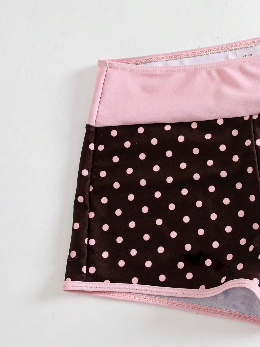 Women's retro pink and blue cartoon sardine print halter two-piece swimwear featuring a high waist shorts bottom and wireless bra with removable padding.