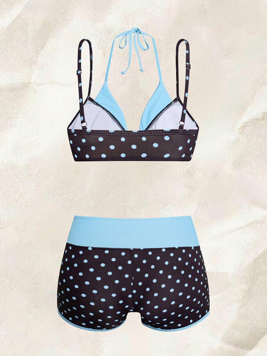 Women's retro pink and blue cartoon sardine print halter two-piece swimwear featuring a high waist shorts bottom and wireless bra with removable padding.