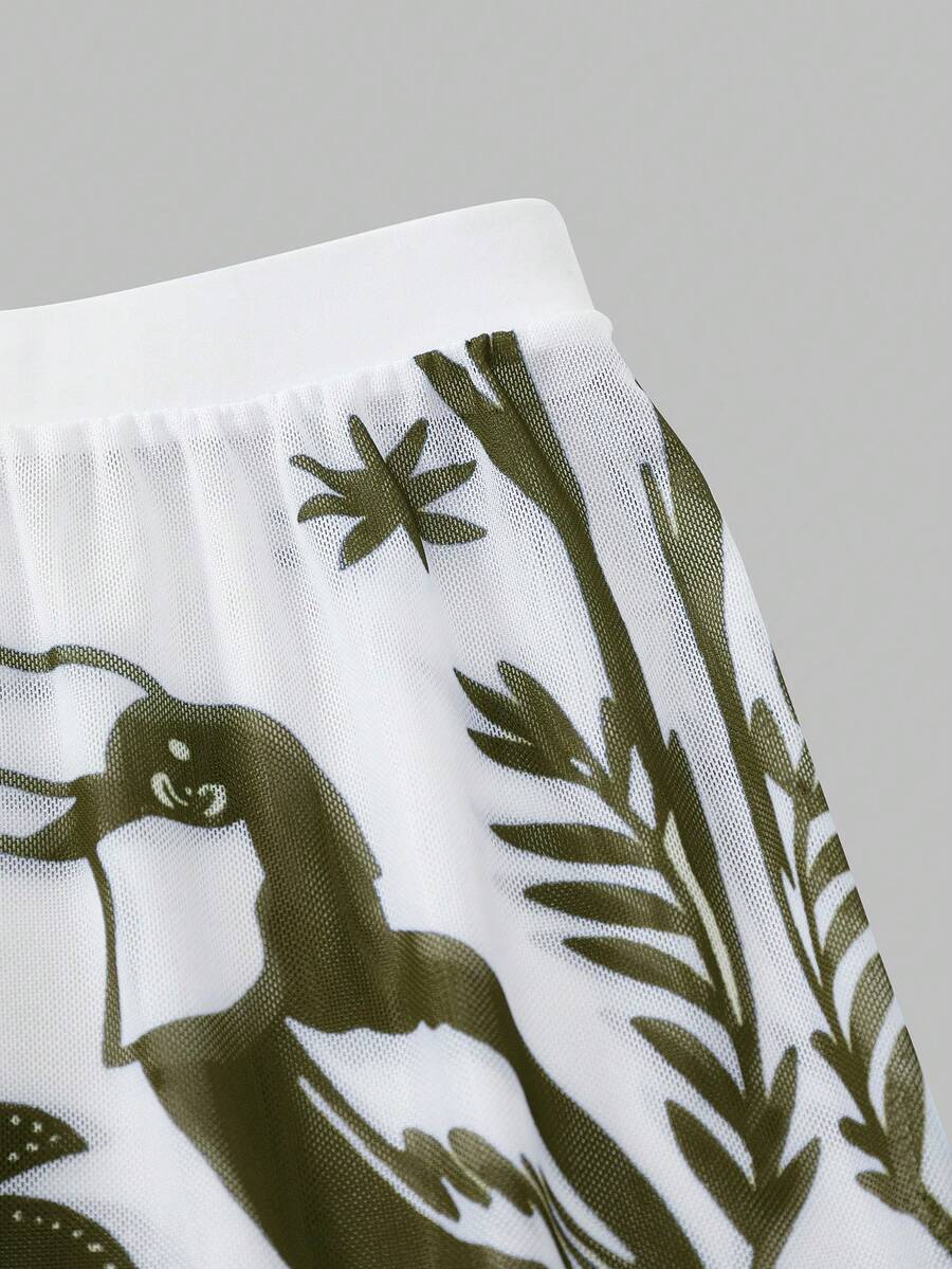 Swim Oasis women's tropical palm tree print army green one-piece swimsuit featuring spaghetti straps, removable padding, and matching shorts for beach vacations.