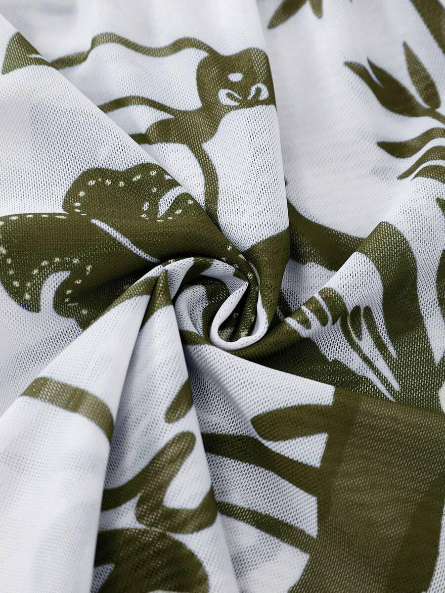 Swim Oasis women's tropical palm tree print army green one-piece swimsuit featuring spaghetti straps, removable padding, and matching shorts for beach vacations.