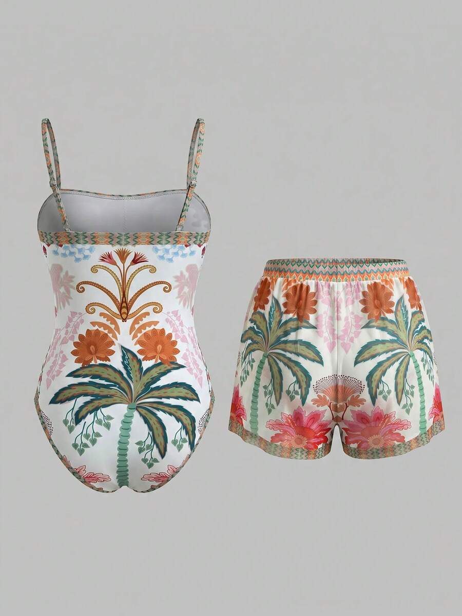 Swim Oasis women's tropical palm tree print army green one-piece swimsuit featuring spaghetti straps, removable padding, and matching shorts for beach vacations.