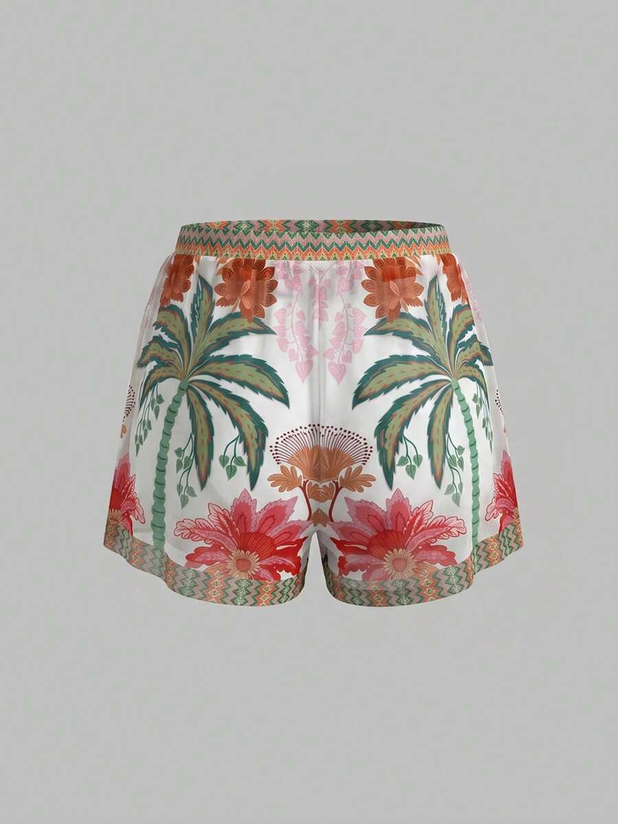 Swim Oasis women's tropical palm tree print army green one-piece swimsuit featuring spaghetti straps, removable padding, and matching shorts for beach vacations.