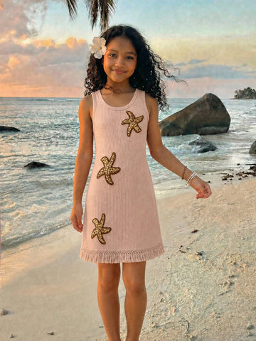 Girls' apricot beach knit short dress with sleeveless tank design, tassel detail, star decoration, round neck, and vacation style for summer seaside wear.
